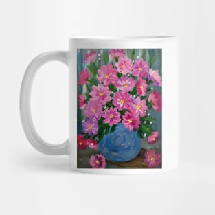 Some beautiful and lovely boutique of pinks and purple flowers in a glass vase Mug